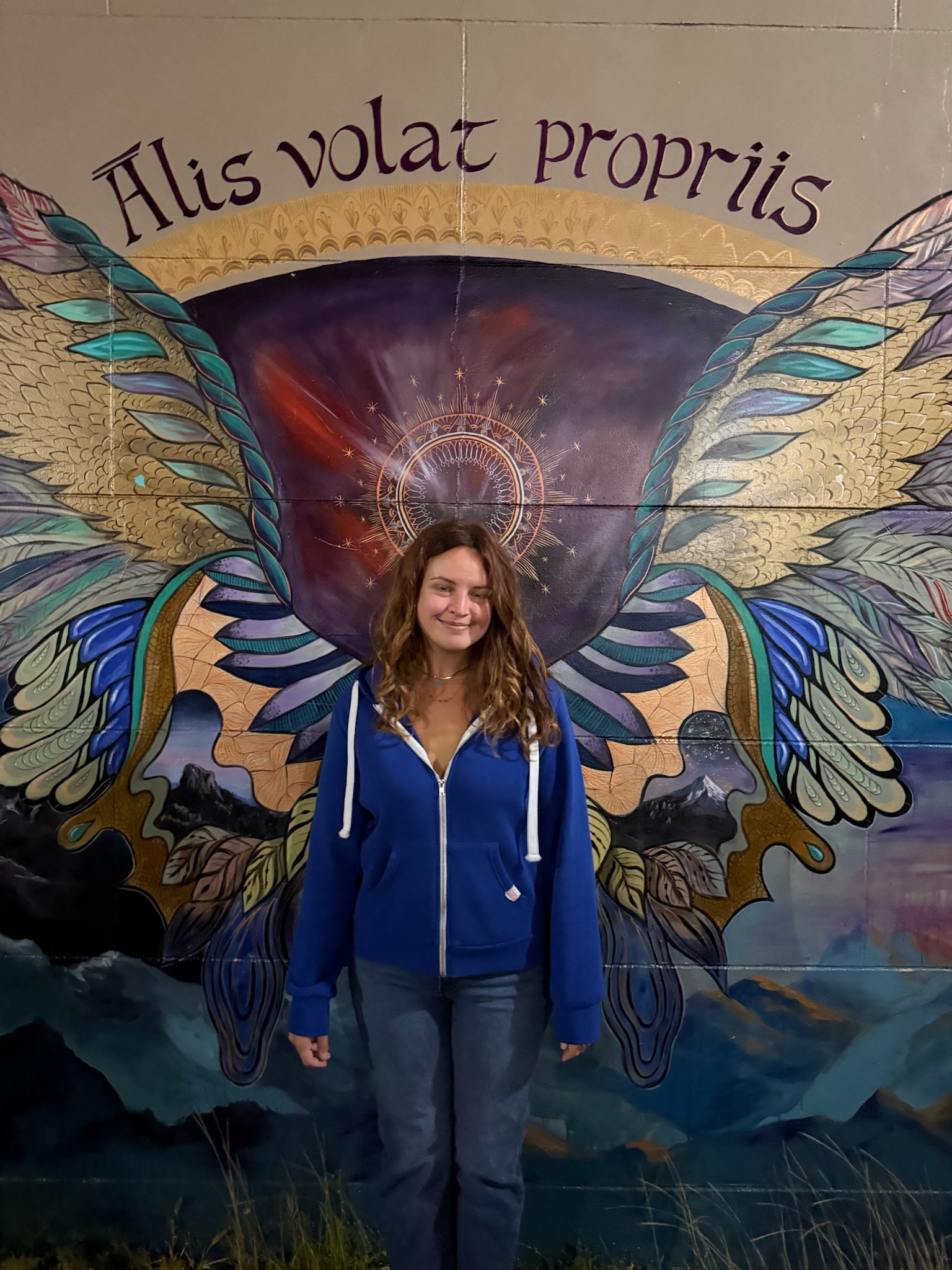 Londynn with the wings mural — out building.