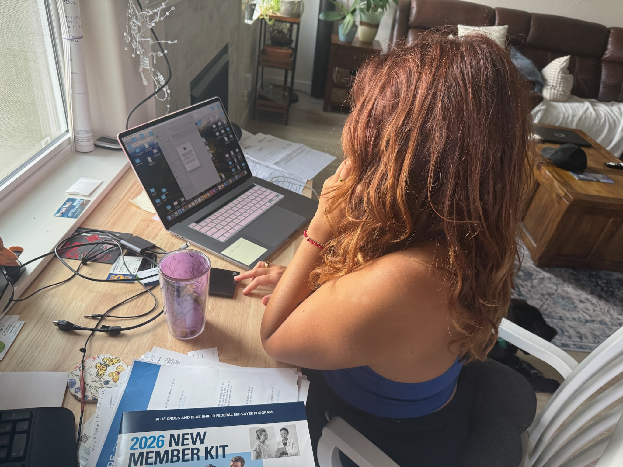 Londynn at work — focused at the desk.